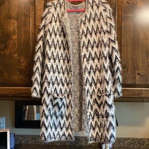 Absolutely Famous brand. GORGEOUS cardigan. Excellent used condition. Worn once.